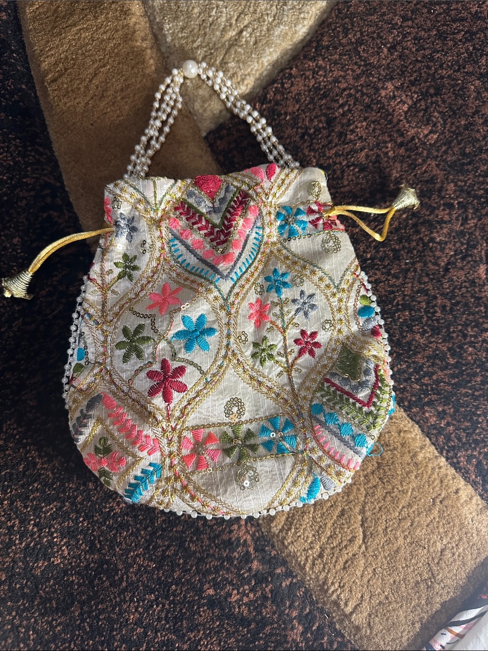 Embroidered Floral Drawstring Wristlet Clutch in Cream with Multicolor Accents